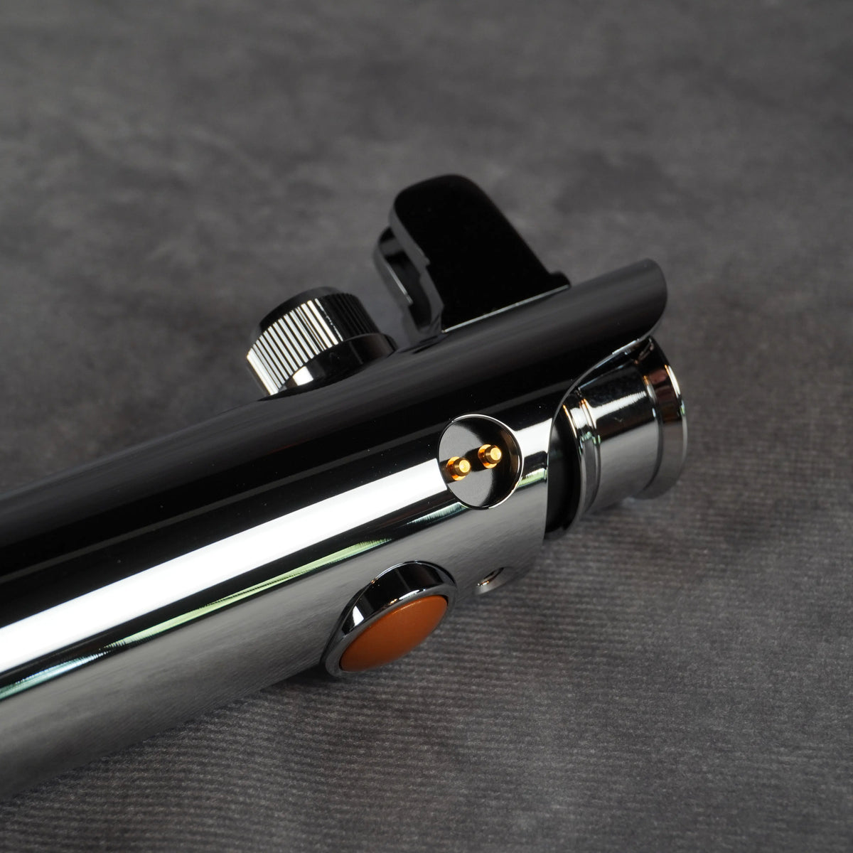 Activation switch detail on the Model Ani Episode III lightsaber hilt