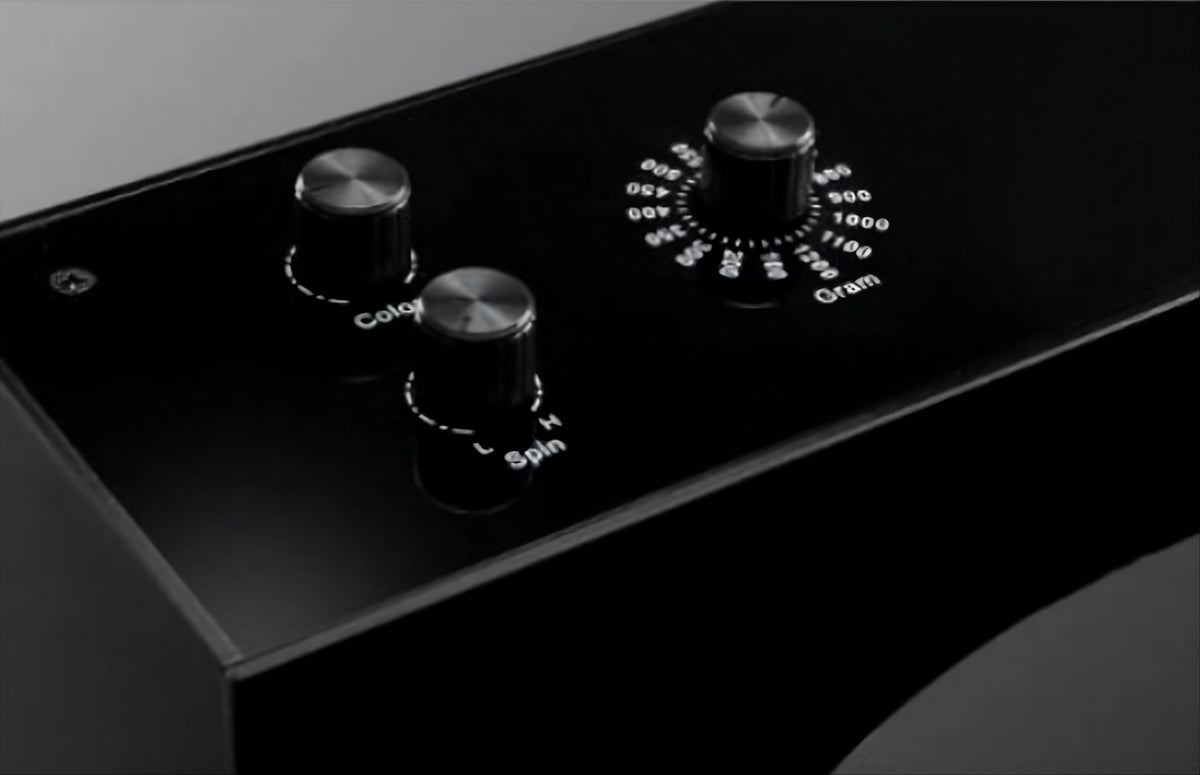 Control dials on top of the floating lightsaber display stand: Colour, Spin speed and hilt weight from 100 to 1,200 grams