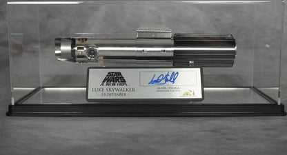 Luke Skywalker A New Hope Graflex lightsaber in an acrylic display case with the Mark Hamill signature plaque