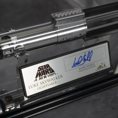 Raffle: Luke Skywalker A New Hope Lightsaber & Signature Plaque Signed by Mark Hamill (+ Display Case & Stand)