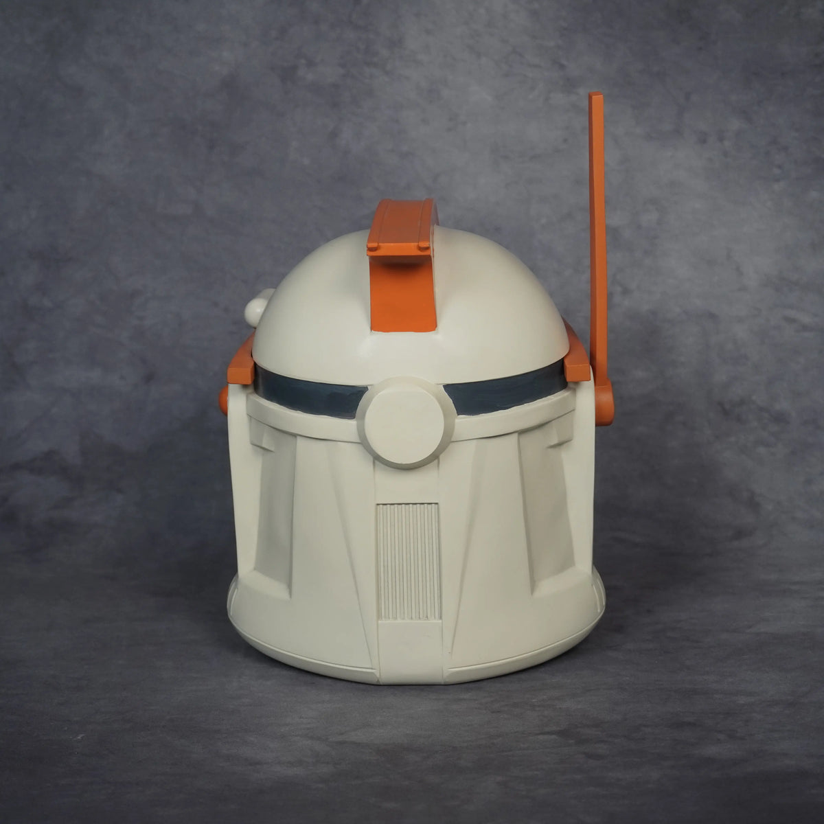 Commander Cody Phase I helmet, three-quarter front view showing the orange visor plate and side antenna