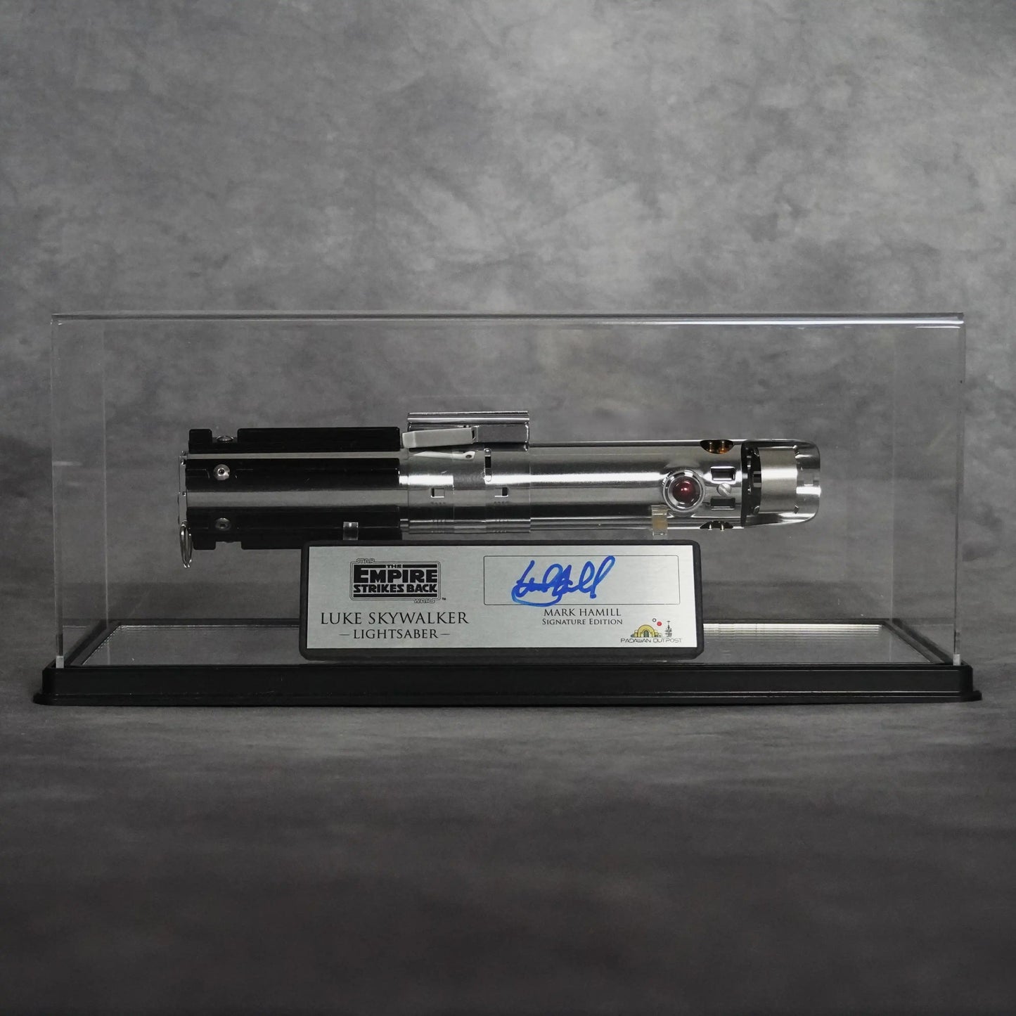 Luke Skywalker Empire Strikes Back lightsaber in display case with Mark Hamill signature plaque