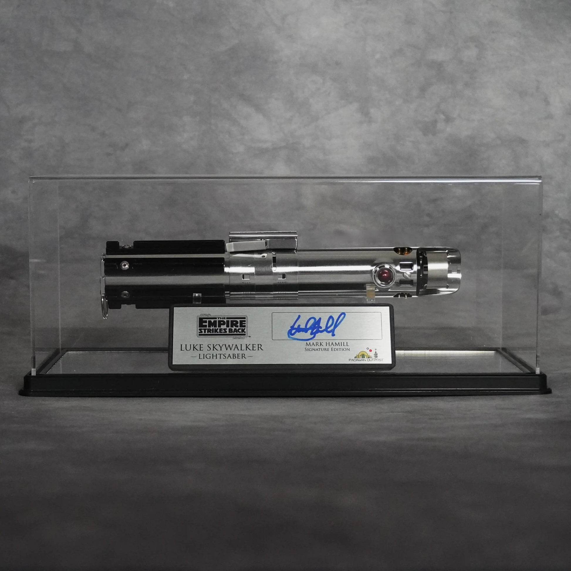 Luke Skywalker Empire Strikes Back lightsaber in display case with Mark Hamill signature plaque