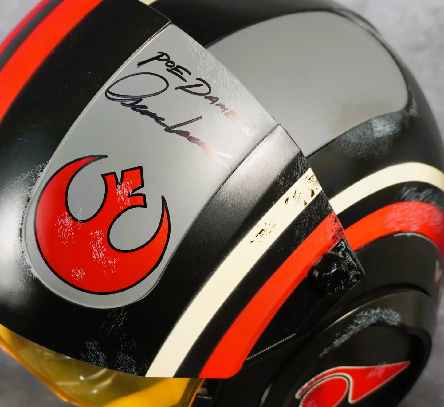 Raffle: The Force Awakens Bundle – Signed Poe Dameron Helmet + Rey & Kylo Sabers