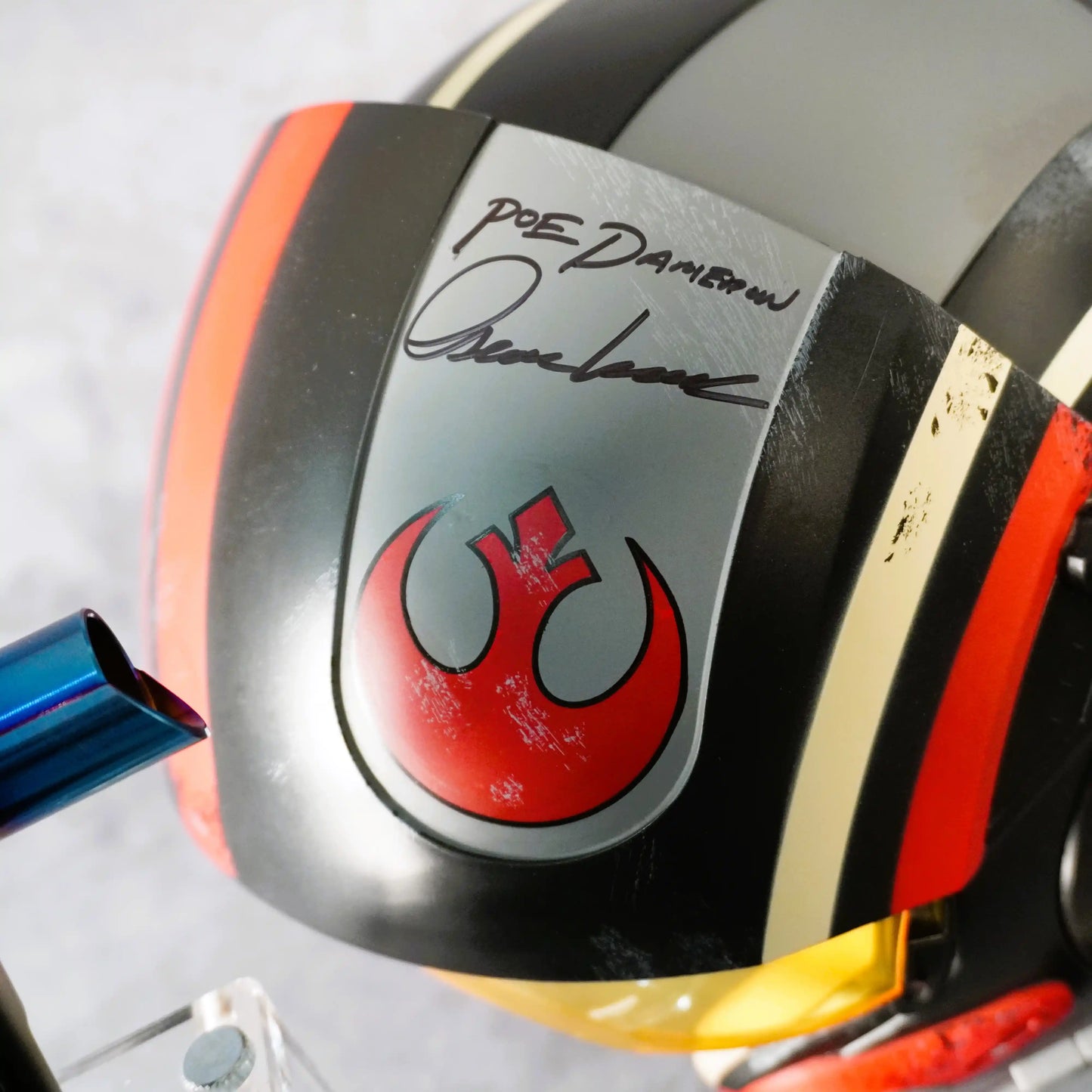 Raffle: The Force Awakens Bundle – Signed Poe Dameron Helmet + Rey & Kylo Sabers