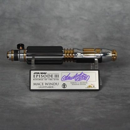 Mace Windu Episode III lightsaber hilt on a display stand with the Signature Edition plaque signed by Samuel L. Jackson in purple ink